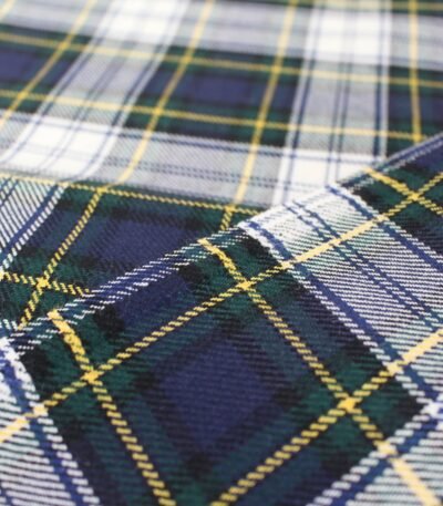 Premium navy and green flannel plaid fabric with yellow and white stripes