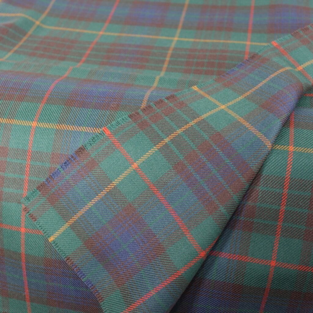 Custom flannel fabric manufacturer: forest green and navy sunset tartan flannel