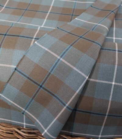 Premium yarn dyed textiles in slate blue and taupe tartan pattern