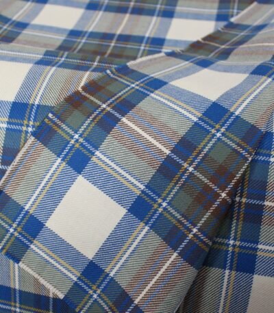 Export quality flannel fabric in cobalt blue and brown tartan pattern